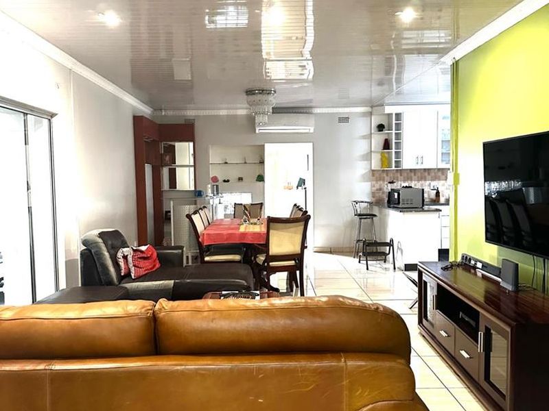 Step into a home that offers both space and versatility, perfectly suited for comfortable family living and effortless entertaining - Photo 2