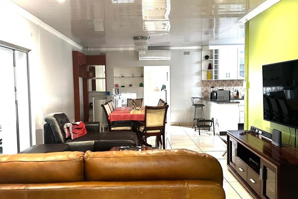 Step into a home that offers both space and versatility, perfectly suited for comfortable family living and effortless entertaining - Photo 2