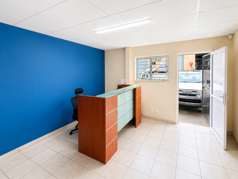 Neat Industrial Unit with Roller Door Access and Reception Office - Photo 3