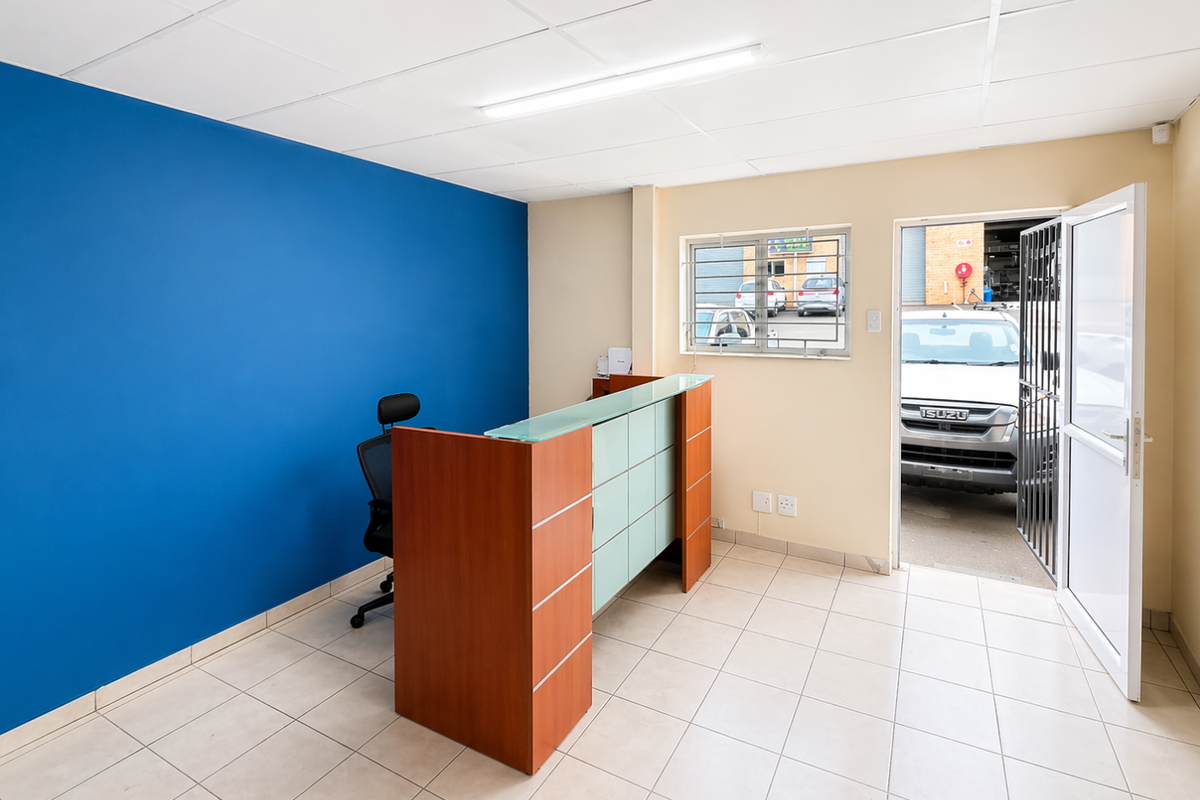 Neat Industrial Unit with Roller Door Access and Reception Office - Photo 3