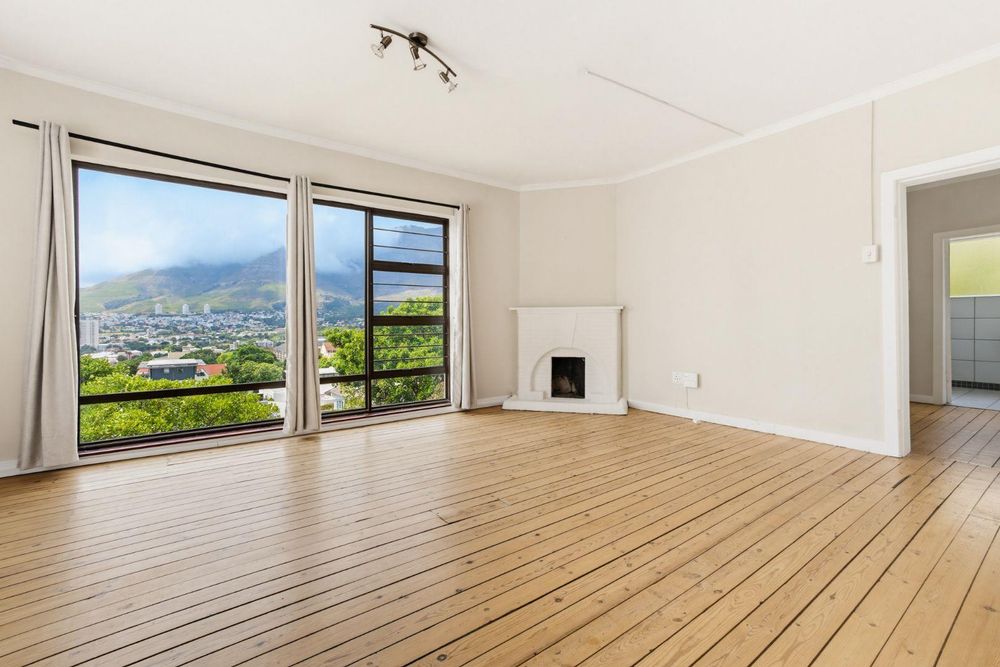 Spacious living and dining area on the upper level with spectacular views bathed in natural sunlight 