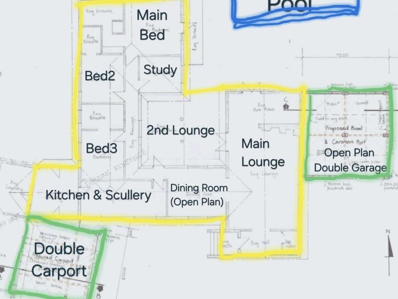 A marked-up architectural floor plan showing the layout of the residence, including living areas, bedrooms, kitchen, and proposed extensions.