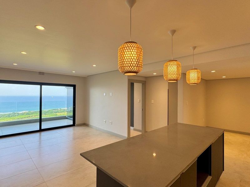 This is a premium, move-in-ready coastal apartment that combines luxury, security, and modern convenience in a sleek, never-before-lived-in space. - Photo 2