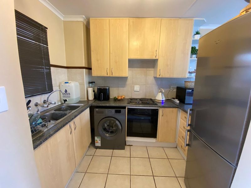 Charming Top-Stack Unit with Stunning Views! - Photo 3