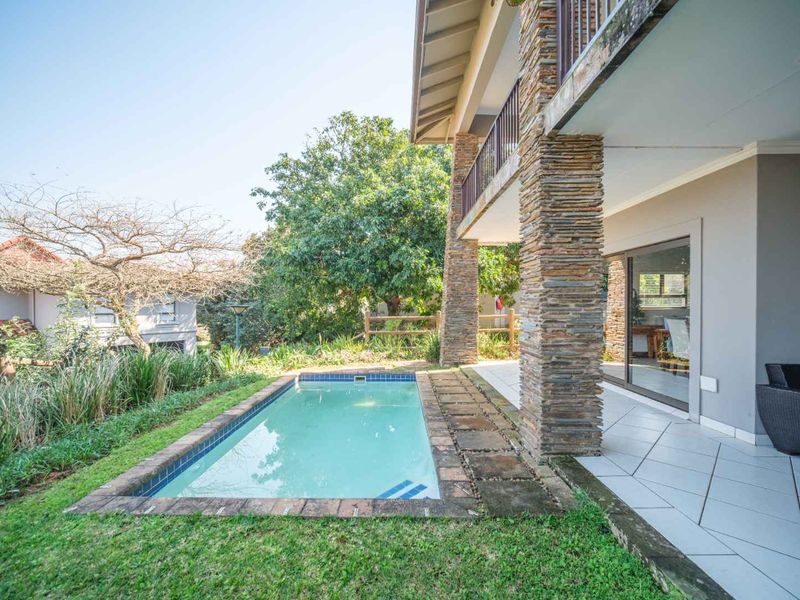 Experience exclusive coastal living in this luxurious, lock-up-and-go apartment within the prestigious Zimbali Coastal Resort. - Photo 2