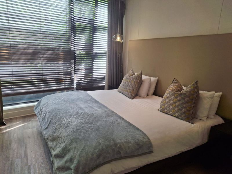 A BEAUTIFULLY FURNISHED TWO BEDROOM APARTMENT - Photo 5