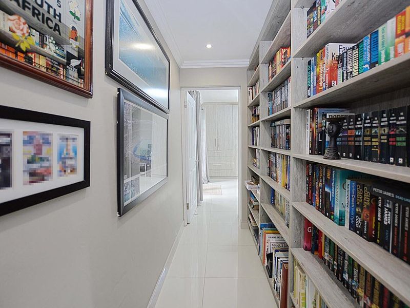 Exceptional 5-Bedroom Home with Versatile Studio in Flamingo Vlei - Photo 8