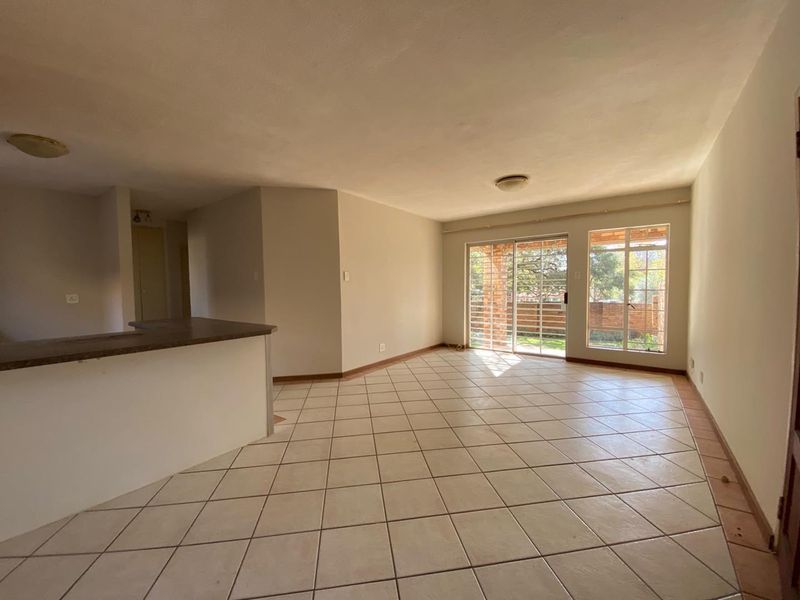 Charming 2-Bedroom Townhouse with Secure Parking & Garden - Photo 3