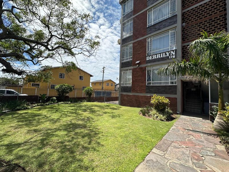 Invest in Bulwer: Cozy 2-Bedroom with Rental Income Potential - Photo 1
