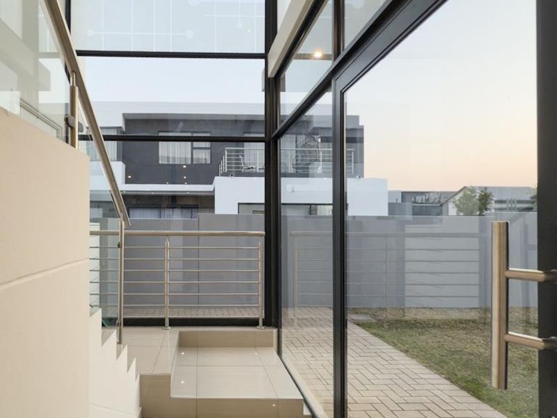 Modern Architectural Gem with Versatile Living & Expansive Balcony in Midstream Meadows - Photo 10