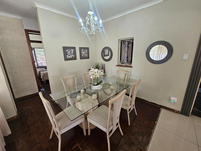Four-Bedroom Family Home with Secure Parking in Austerville - Photo 7