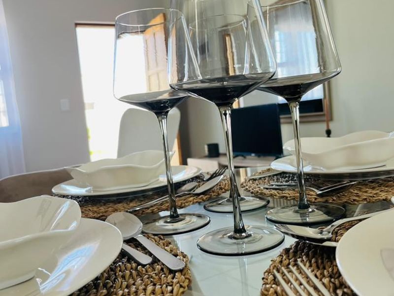 A close-up view of a dining table setting in a residential living space.