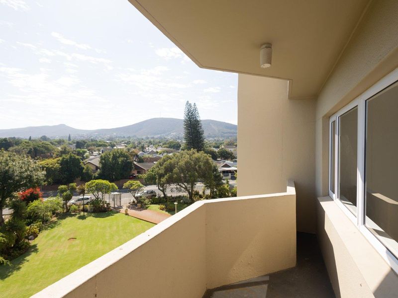 Spacious living with scenic views in a secure setting. - Photo 10