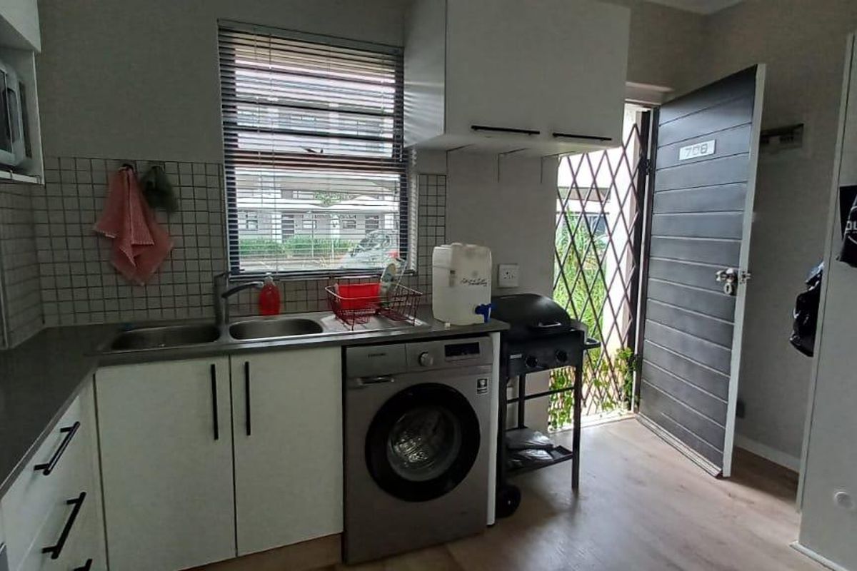 Pet-Friendly Ground Floor Gem with Pool & Gym - Photo 3