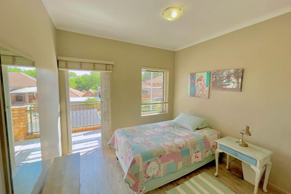 **Charming 3-Bedroom Home with Separate Flatlet, Backup Power, and Low Levies in Faeriedale Security Village, Faerie Glen** - Photo 5