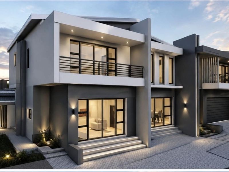 Modern double-story residential facade featuring clean architectural lines, a private balcony, large glass sliding doors, and integrated exterior lighting.