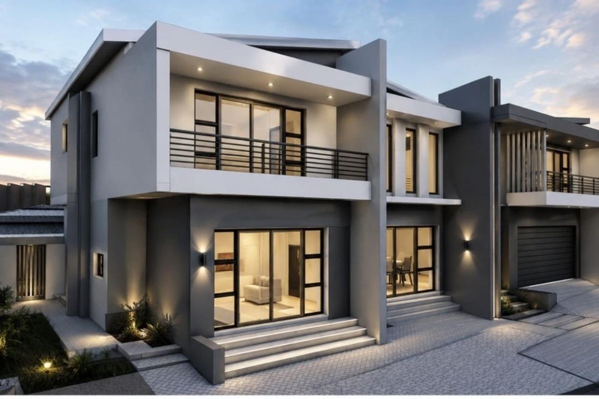 Modern double-story residential facade featuring clean architectural lines, a private balcony, large glass sliding doors, and integrated exterior lighting.