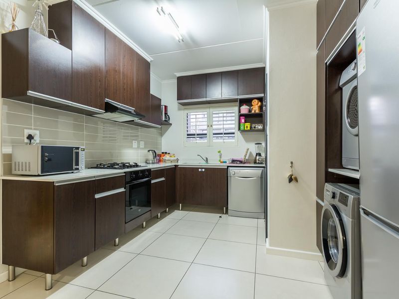 LOCK-UP AND GO LIVING AT ITS FINEST! - Photo 3