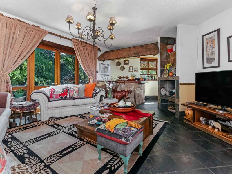 AN EXQUISITE, BUSH LODGE-THEMED, FAMILY SANCTUARY OFFERING TIMELESS ELEGANCE AND UNMATCHED TRANQUILITY IN A SERENE INDIGENOUS GARDEN SETTING - Photo 4