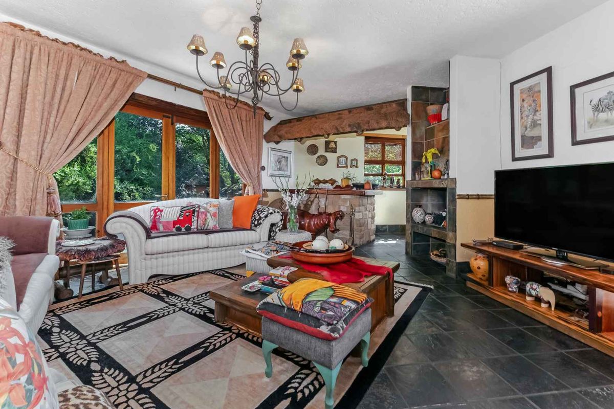 AN EXQUISITE, BUSH LODGE-THEMED, FAMILY SANCTUARY OFFERING TIMELESS ELEGANCE AND UNMATCHED TRANQUILITY IN A SERENE INDIGENOUS GARDEN SETTING - Photo 4