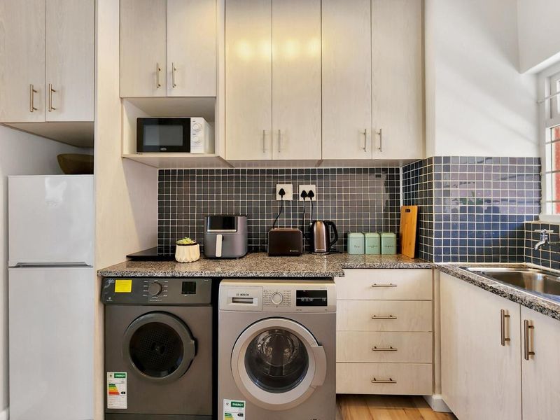 Turnkey Airbnb Investment | Furnished | Parking | Walk to Promenade | ±R200,000 Net Annual Income (C) - Photo 7