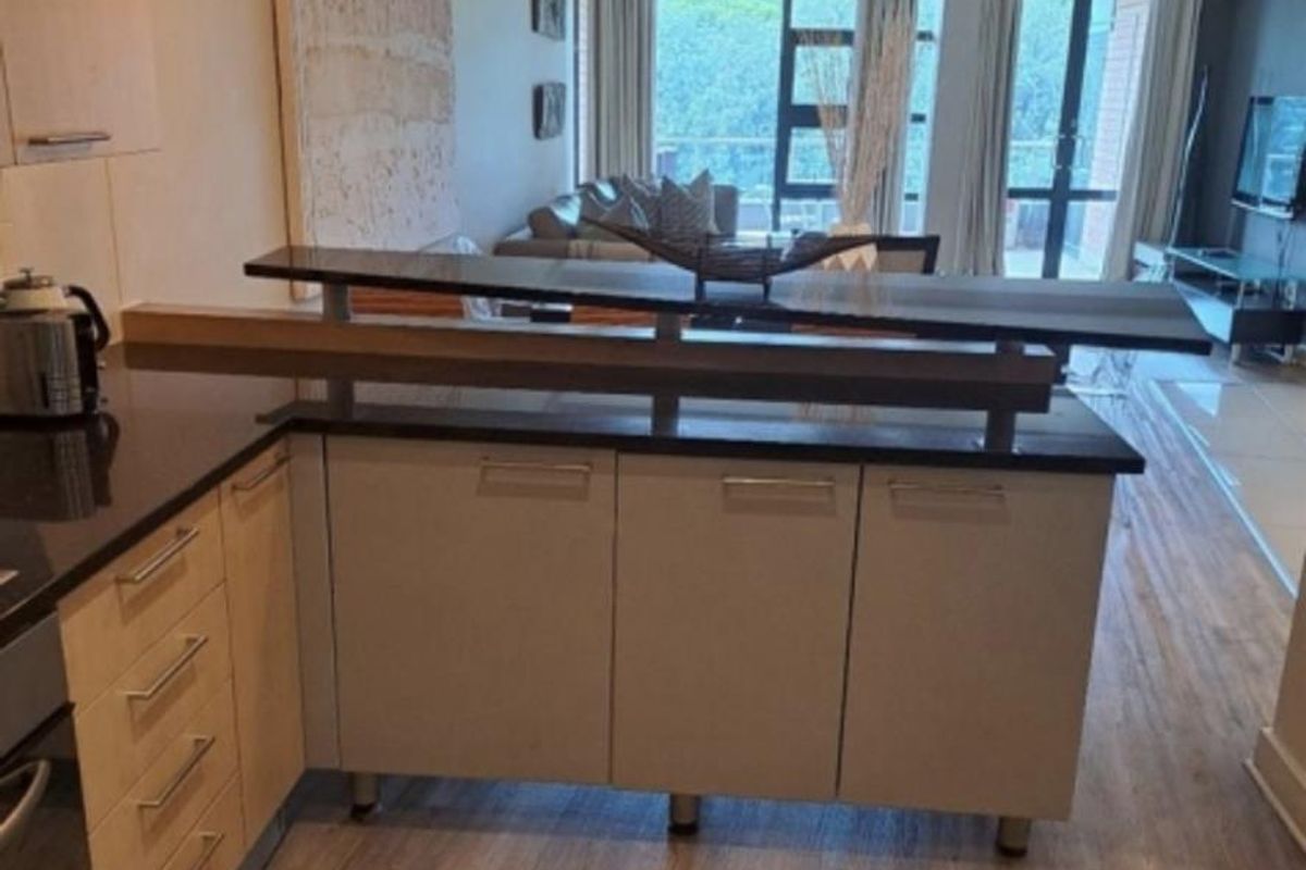 A BEAUTIFULLY FURNISHED TWO BEDROOM APARTMENT - Photo 2