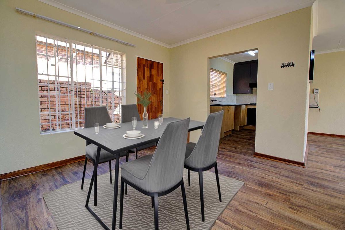 Bright Newly Painted Home with New Laminated Floors! - Photo 3