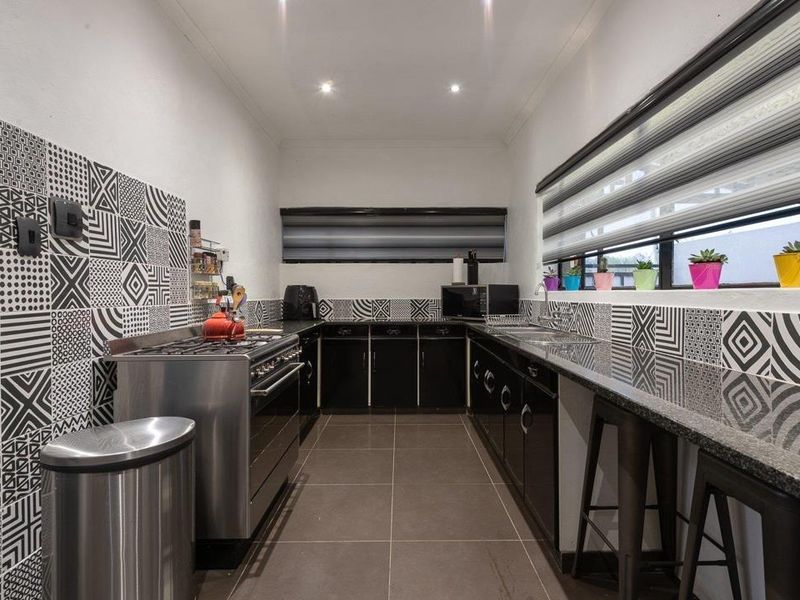 Secure Family Living with Pool and Spacious Garaging - Photo 4