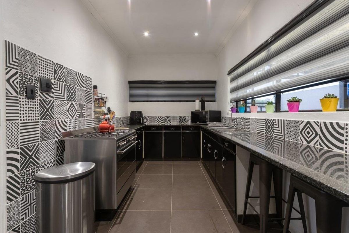 Secure Family Living with Pool and Spacious Garaging - Photo 4