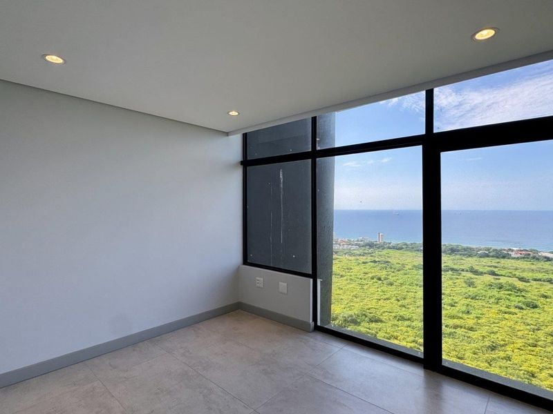 This is a premium, move-in-ready coastal apartment that combines luxury, security, and modern convenience in a sleek, never-before-lived-in space. - Photo 7
