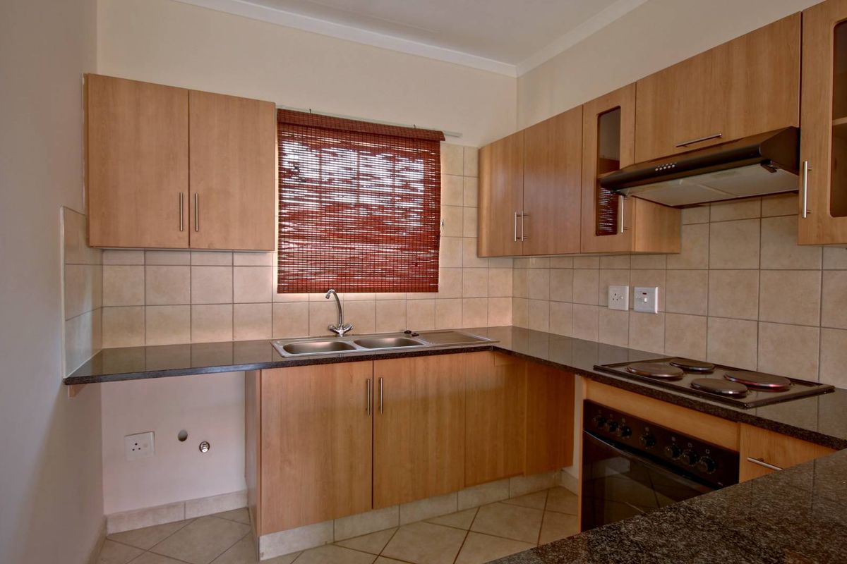 Prime Location! Modern Apartment with 24/7 Security! - Photo 5