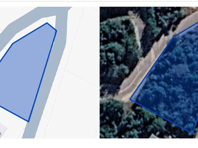 An aerial view and map overlay showing the boundaries of the vacant residential land plot.
