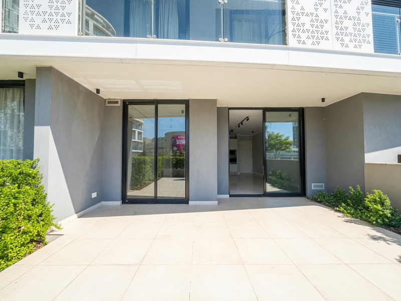 Luxury Ground-Floor Living with Expansive Patio at Ellipse Waterfall - Photo 9