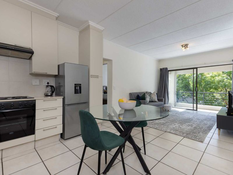 A WELL- POSITIONED MIDDLE FLOOR UNIT IN SOUGHT AFTER TEQUILA SUNRISE - Photo 3