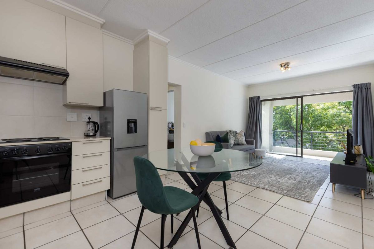 A WELL- POSITIONED MIDDLE FLOOR UNIT IN SOUGHT AFTER TEQUILA SUNRISE - Photo 3