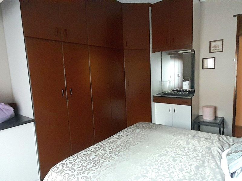 Sunford 4-Bedroom Haven: Perfect for Modern Family Living - Photo 10