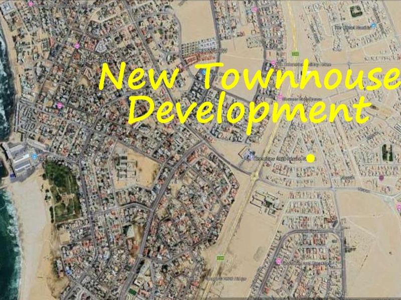 An aerial satellite view showing the location of the new townhouse development within the surrounding urban area.