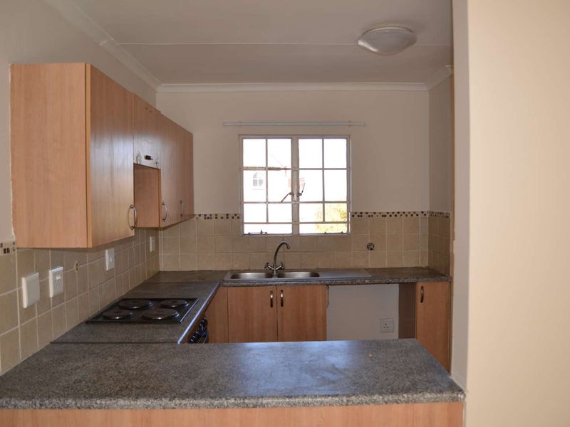 Charming 2-Bedroom Townhouse Perfect for First-Time Buyers and Investors - Photo 8