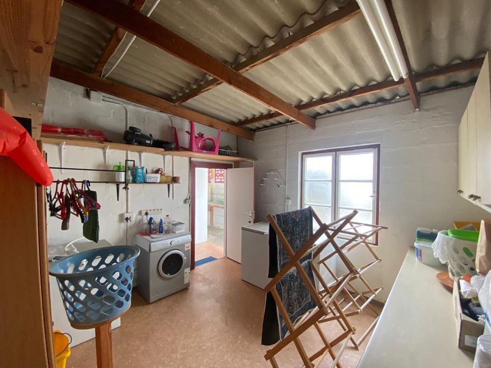 Laundry room. Can be used as the second flats' lounge