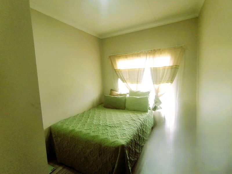 Charming 2-bedroom Cluster House - Photo 8