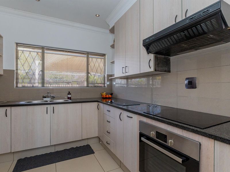 Modern 3-Bedroom Entertainer’s Dream Home with Jacuzzi Room & Heated Pool in Birch Acres - Photo 10