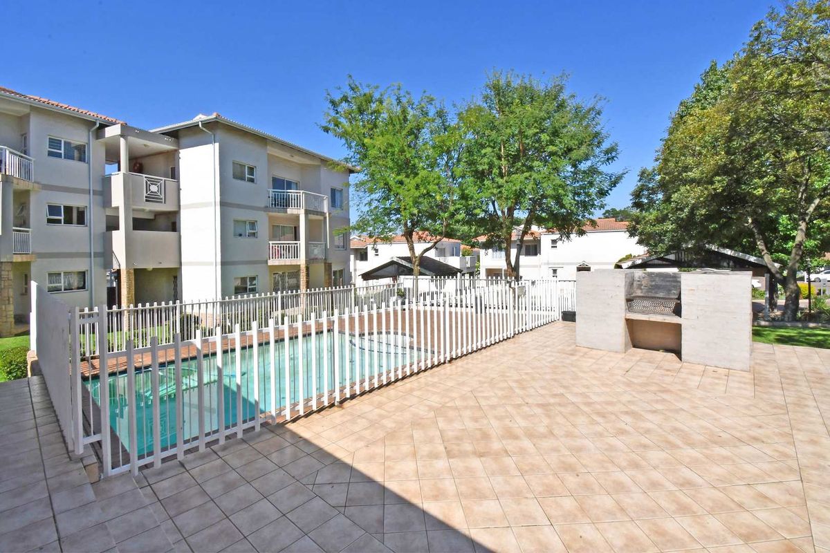 Light-Filled Living with Peaceful Green Views in a Secure Estate - Photo 2