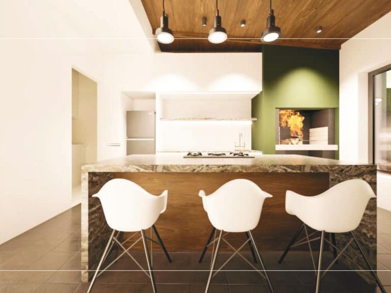 Modern kitchen featuring a large stone island, timber ceiling, and a built-in indoor fireplace, creating a warm and sophisticated culinary space.