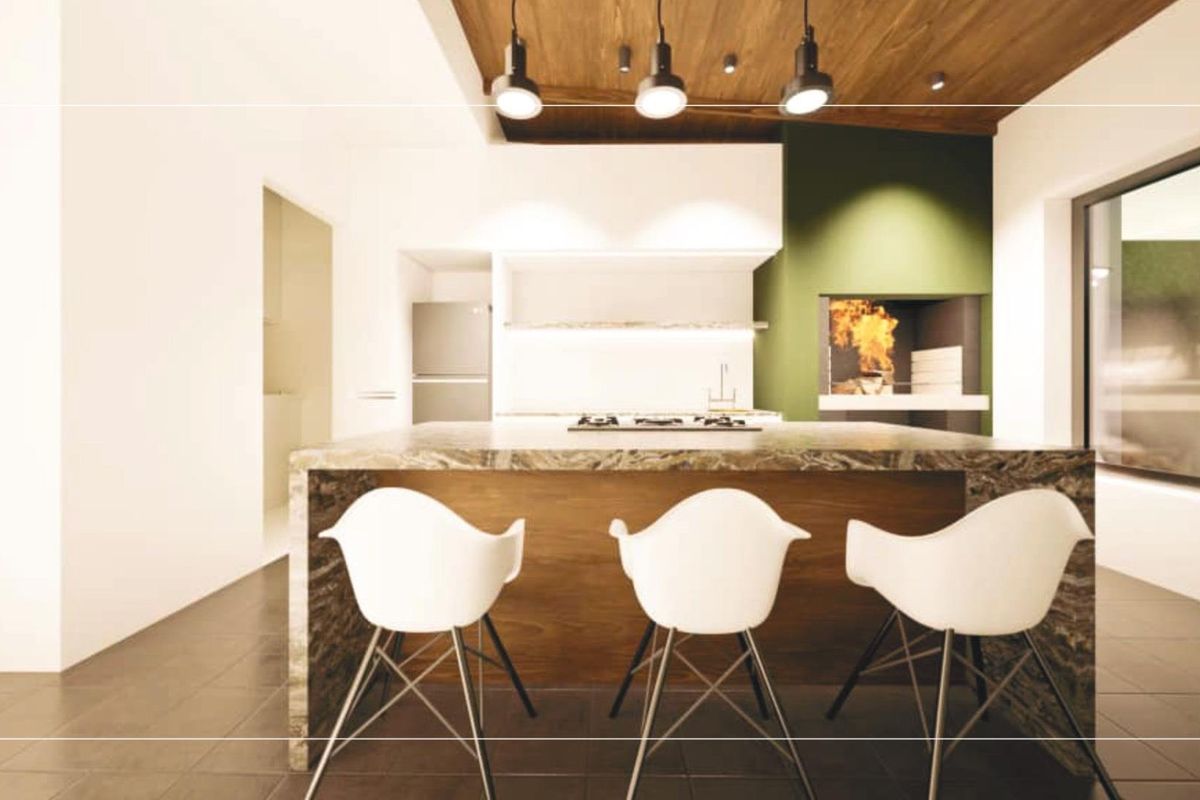 Modern kitchen featuring a large stone island, timber ceiling, and a built-in indoor fireplace, creating a warm and sophisticated culinary space.