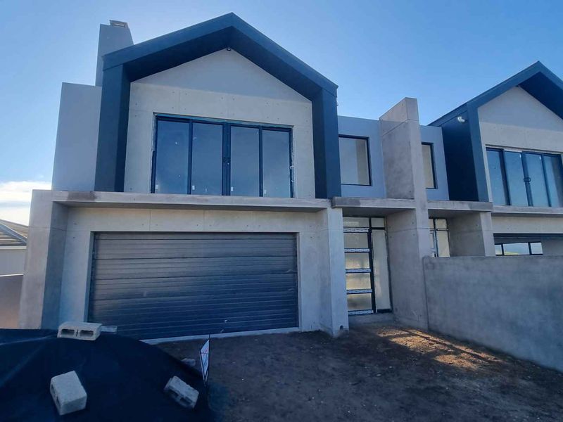 SUNBIRD 8A – Flexible Coastal Living with Exceptional Design - Photo 1