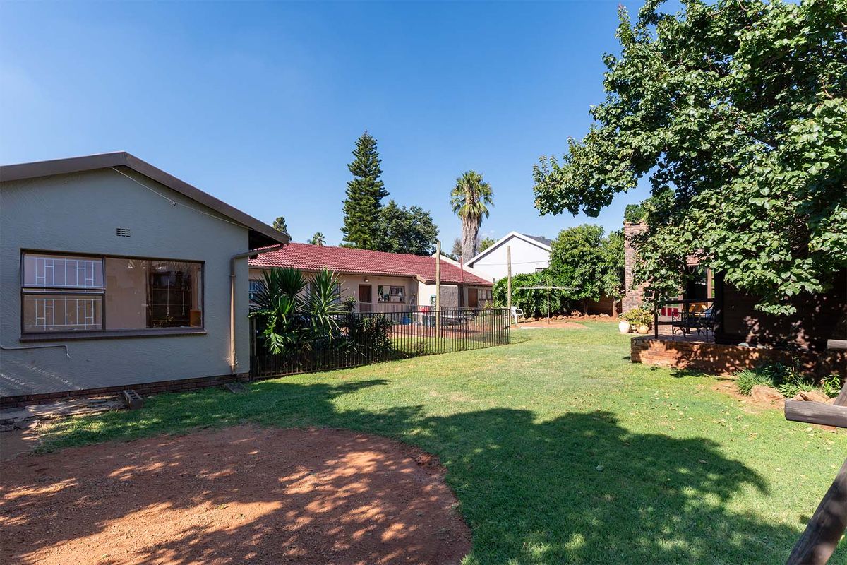 Spacious 5-Bedroom Family Home with Income-Generating Flatlet in Birch Acres - Photo 4