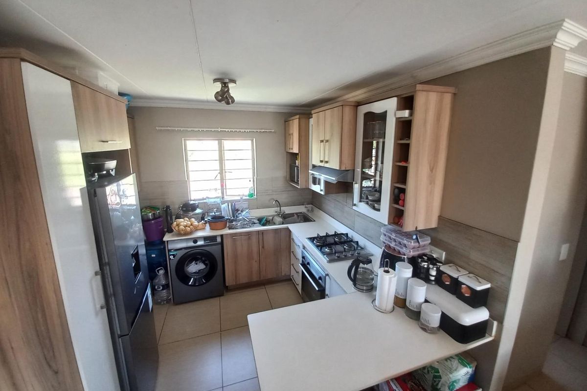 Spacious Living and Peace of Mind in Grand West Estate! - Photo 2