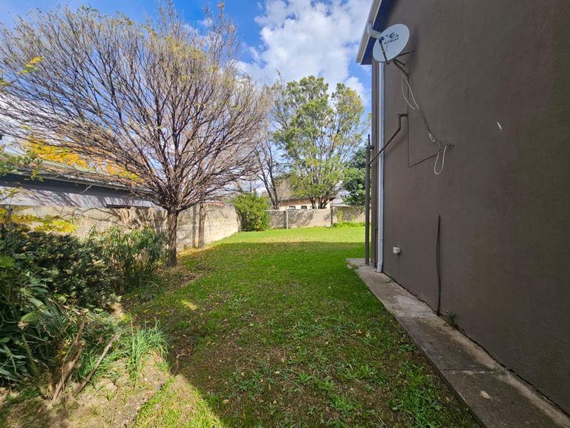 **Charming Double Storey Home in a Tranquil Setting** - Photo 4