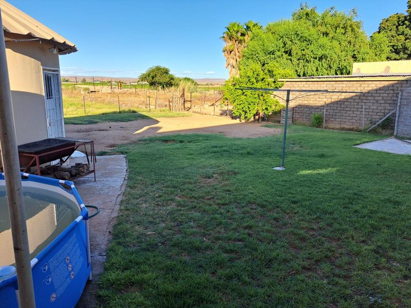 Perfect Blend of Living & Earning - 3 Bedroom House with Self-Contained Flat! - Photo 7