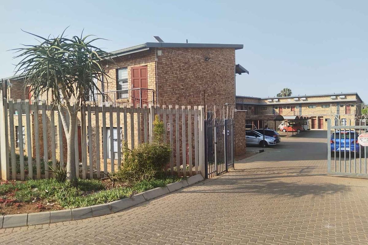 Discover Affordable, Secure and Comfortable living in Elandspoort!!! - Photo 2